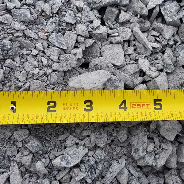 pile of 8190 limestone with measuring tape