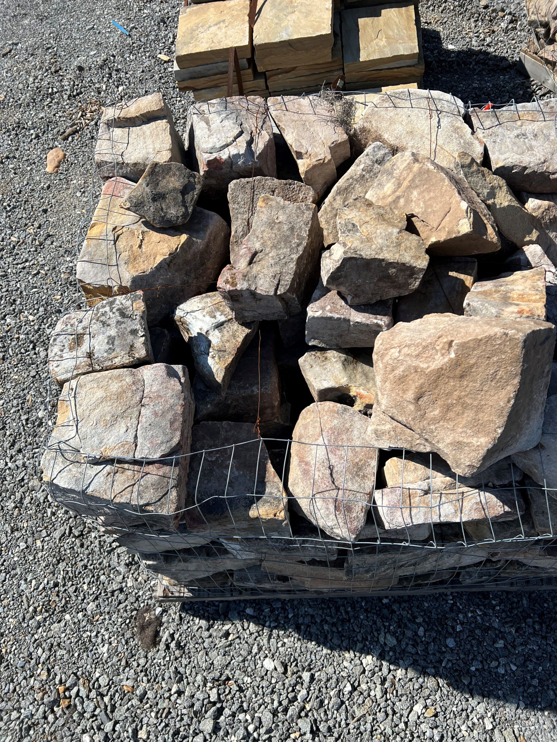 stack of medium fieldstone landscaping rocks